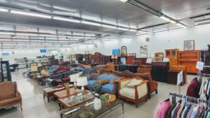 Variety of furniture items at Long Beach Beacon House Thrift Shop